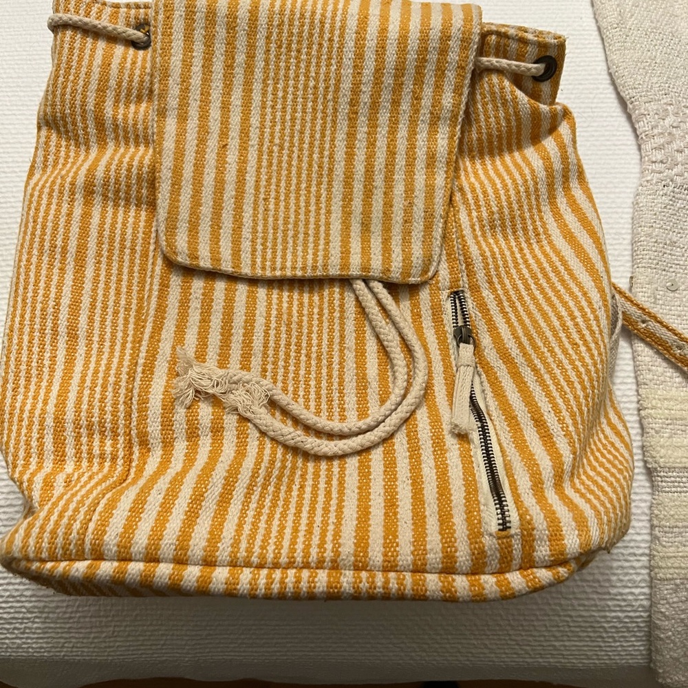 Yellow and cream target book bag